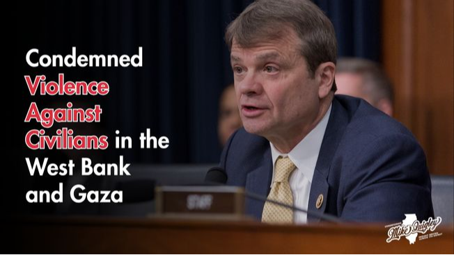 Rep Quigley speaking from a dais with text overlaid