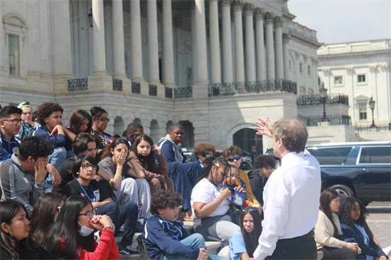 Congressman Quigley addressing a group of students on the Capitol steps