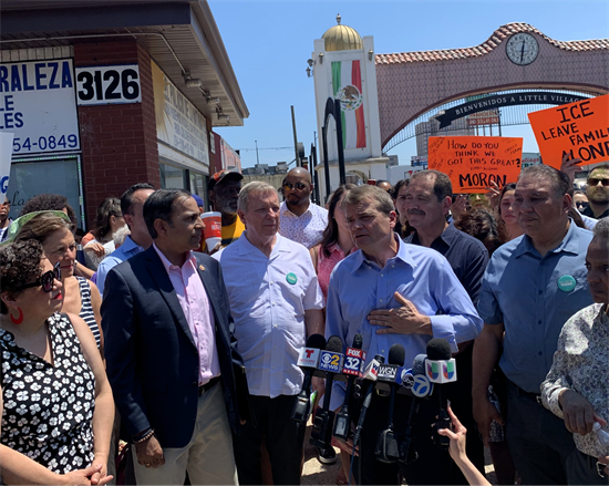 Congressman Quigley addressing news